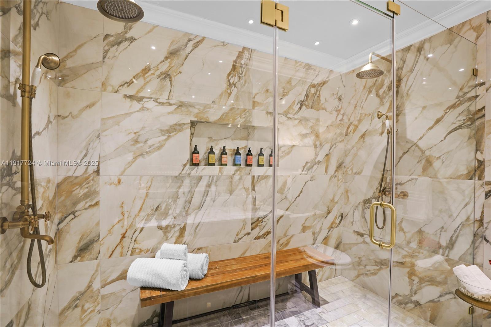 1625 Daytonia Road Miami Beach, FL 33141 - Photo 16 of 39 a bathroom with a shower curtain and a sink