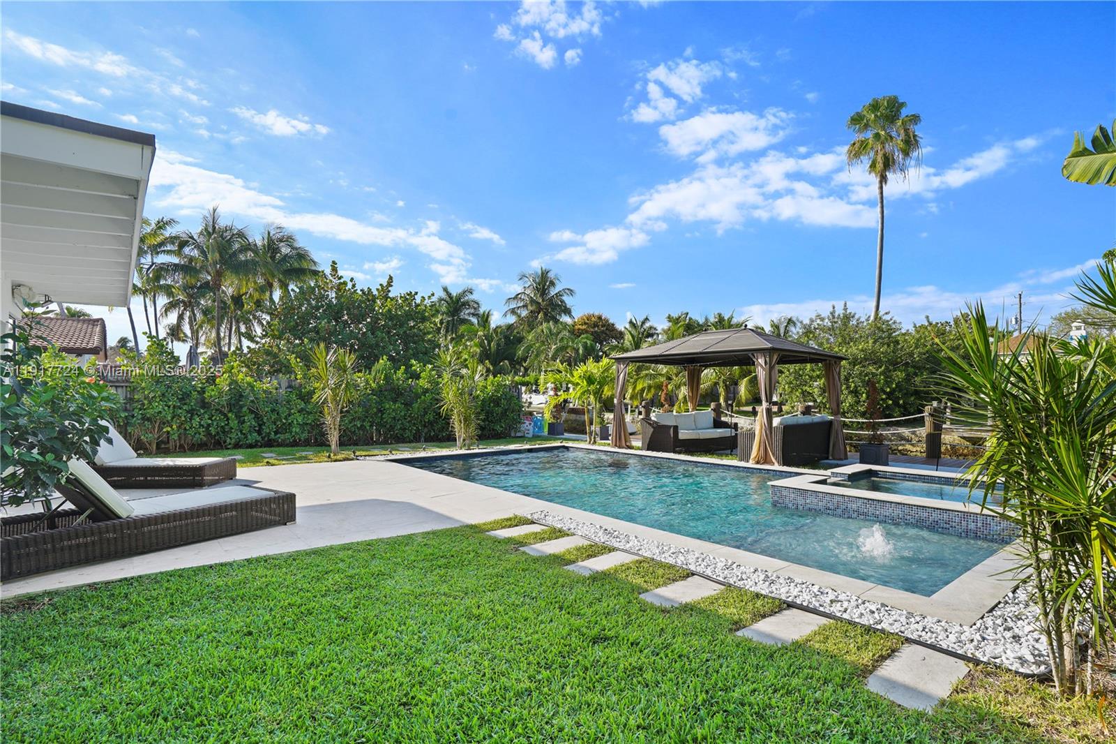 1625 Daytonia Road Miami Beach, FL 33141 - Photo 27 of 39 a view of a swimming pool with a patio