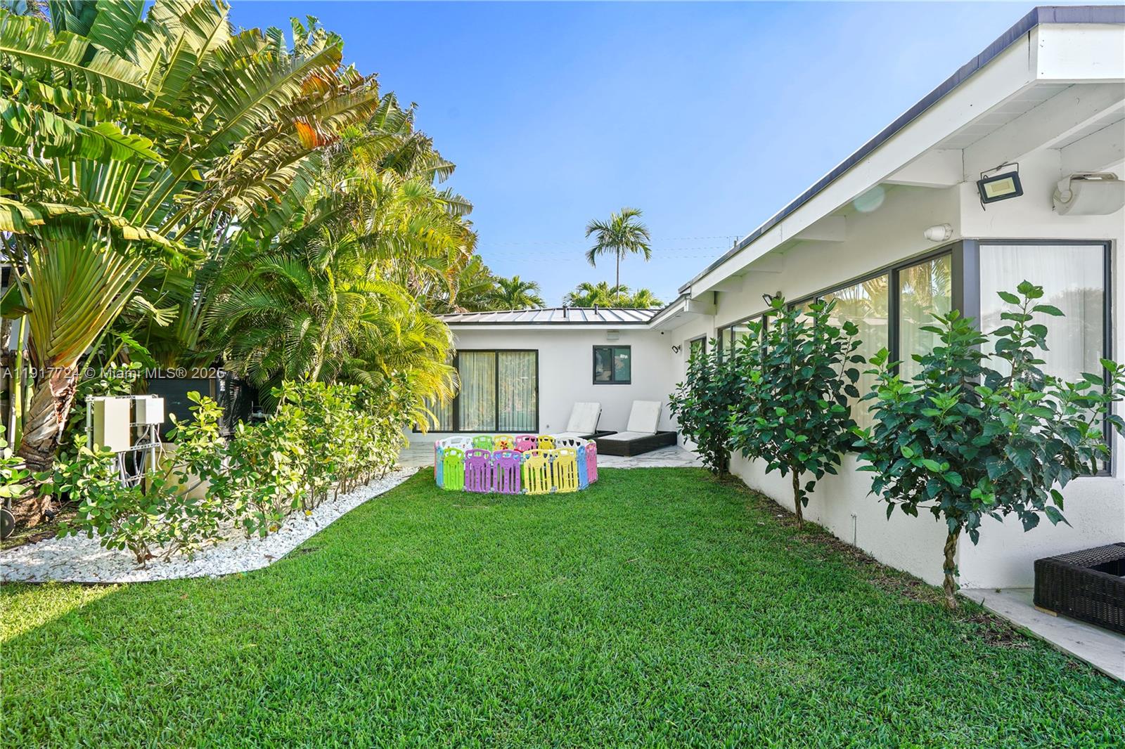 1625 Daytonia Road Miami Beach, FL 33141 - Photo 28 of 39 a view of an house with backyard space and garden