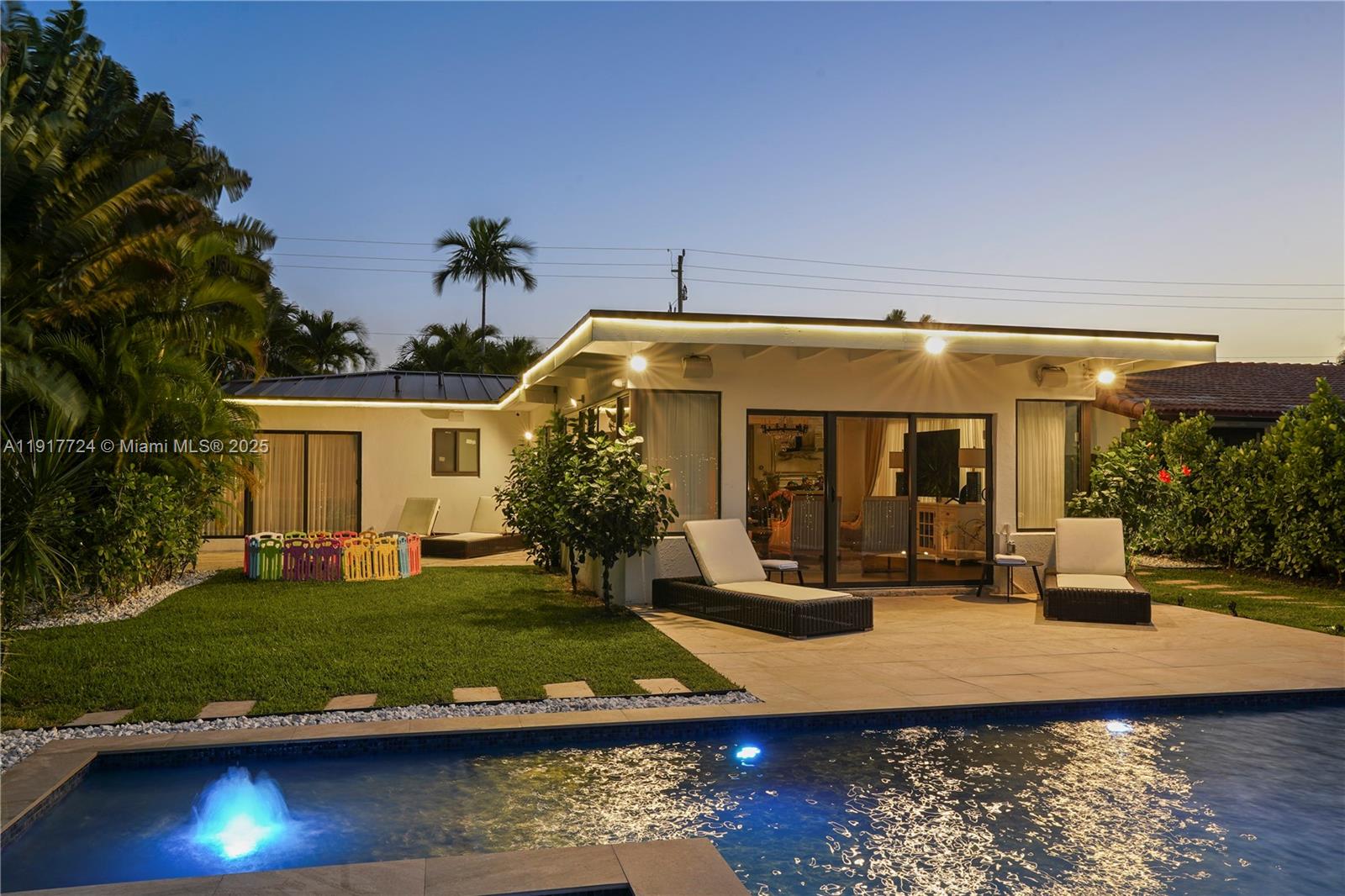 1625 Daytonia Road Miami Beach, FL 33141 - Photo 38 of 39 a front view of a house with garden