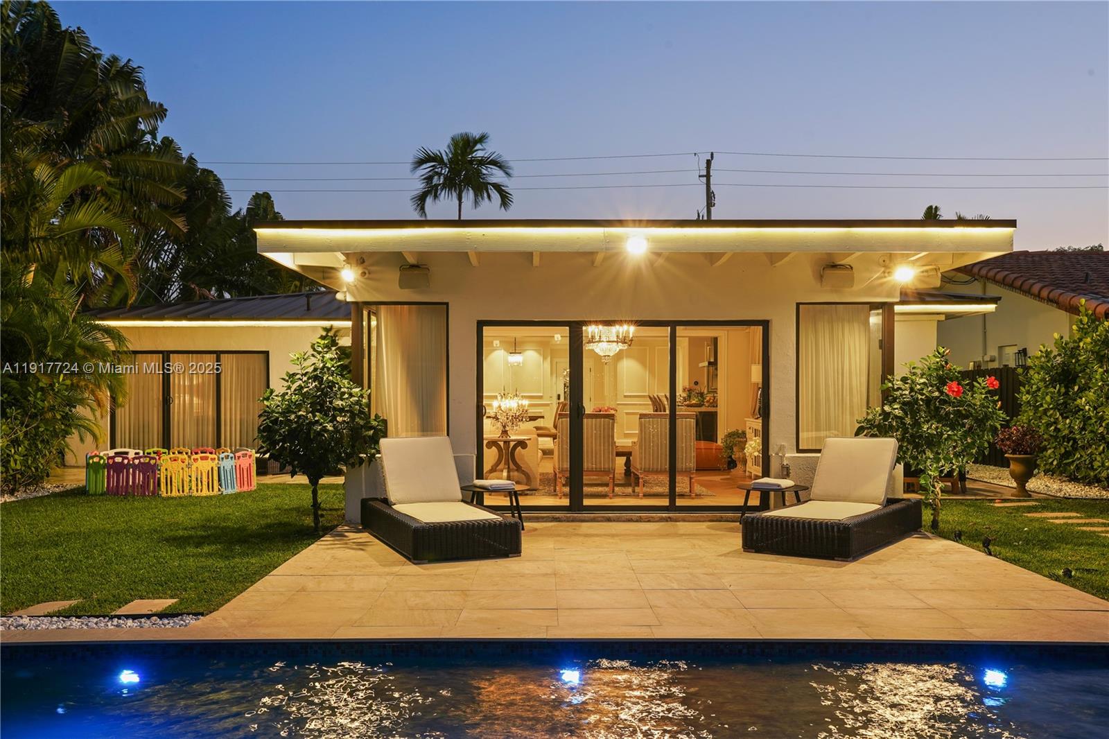 1625 Daytonia Road Miami Beach, FL 33141 - Photo 39 of 39 a view of swimming pool with outdoor seating and yard