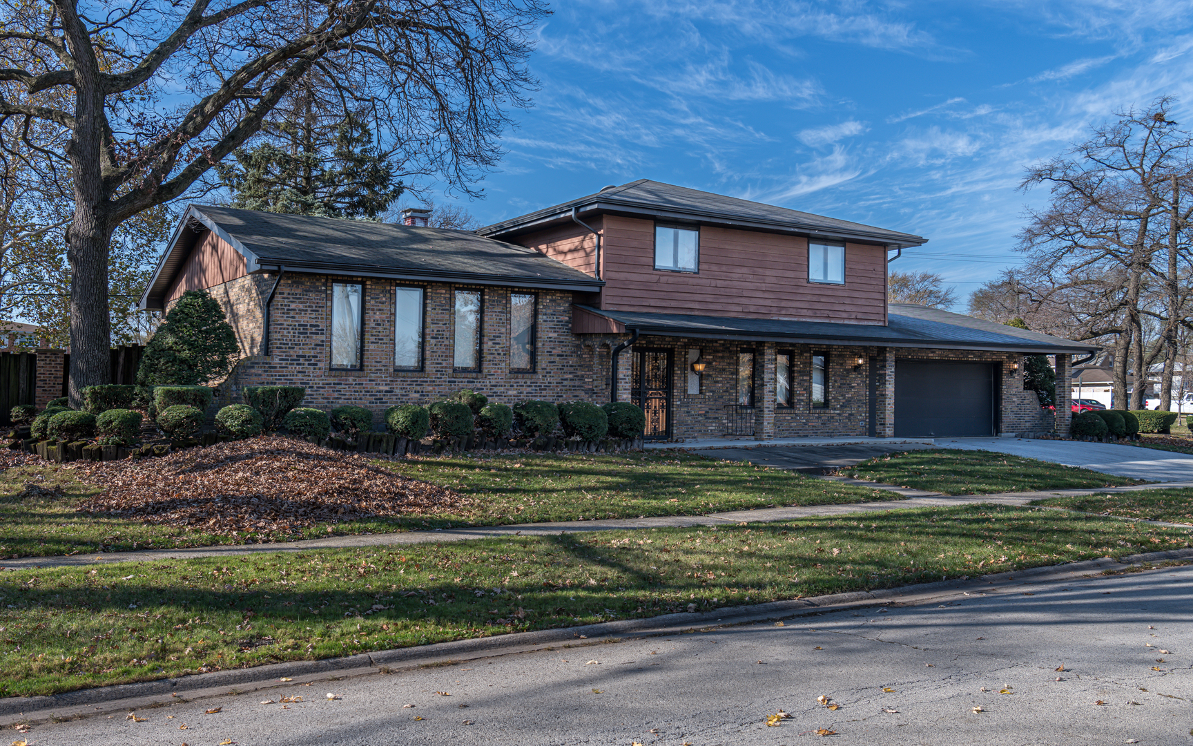 14400 Shepard Drive Dolton, IL 60419 - Photo 1 of 55 a front view of a house with a yard