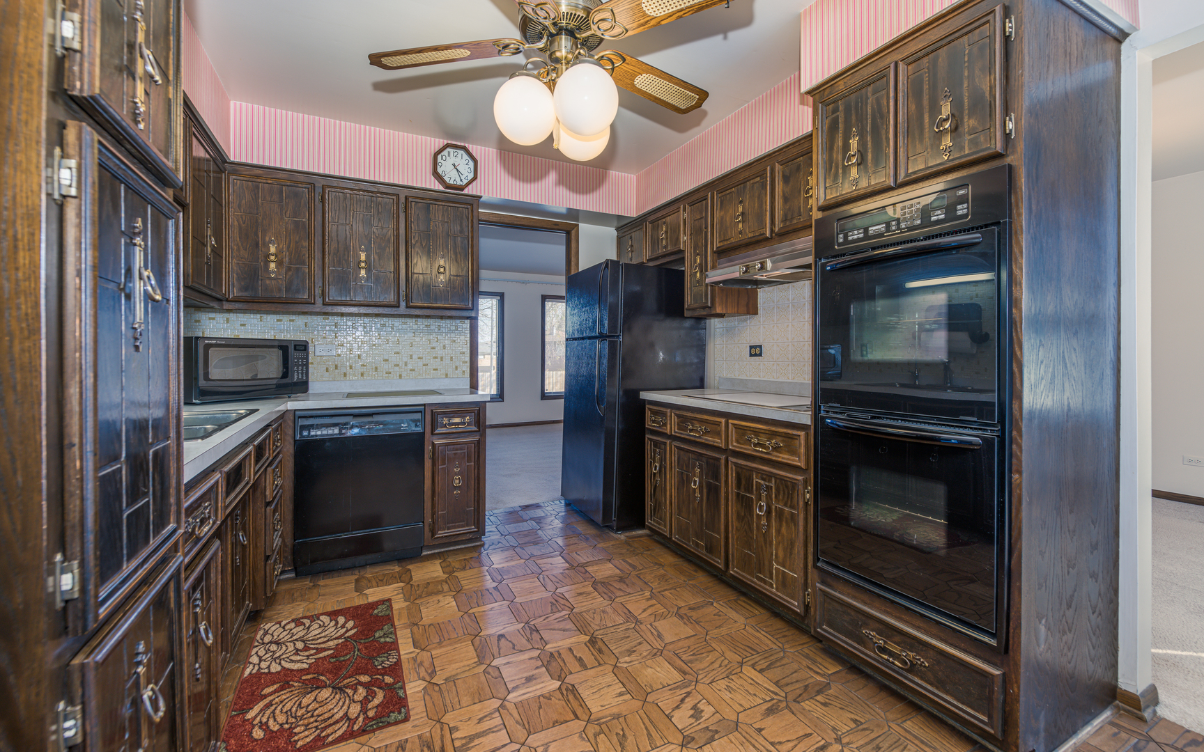 14400 Shepard Drive Dolton, IL 60419 - Photo 11 of 55 a kitchen with stainless steel appliances granite countertop a stove and a refrigerator