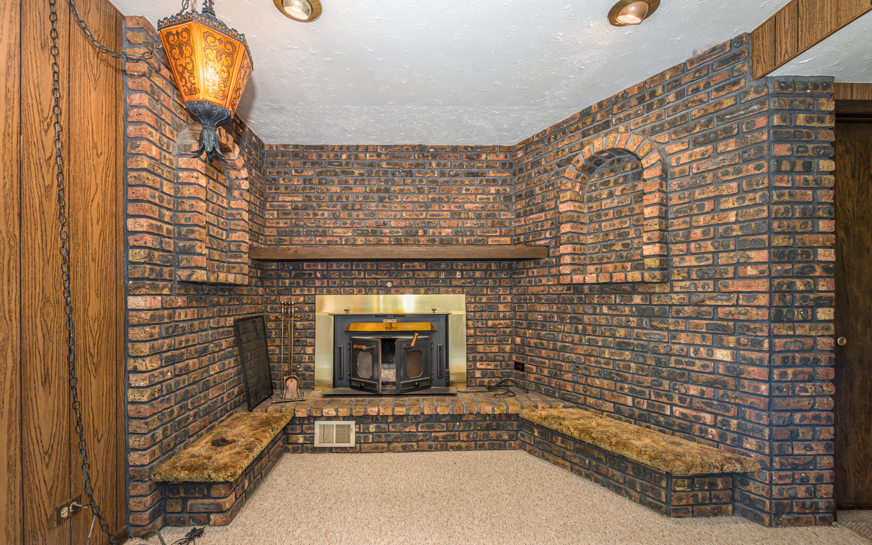 14400 Shepard Drive Dolton, IL 60419 - Photo 16 of 55 a view of empty room with brick wall and fireplace