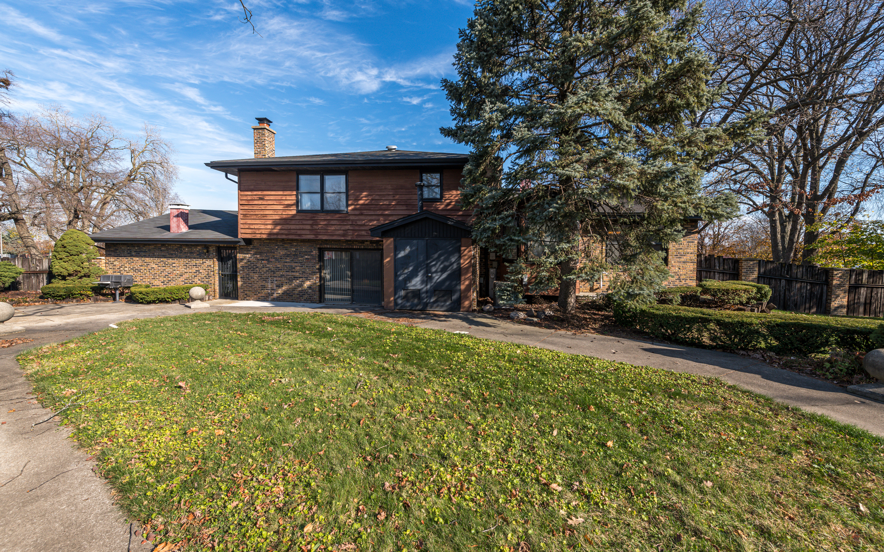 14400 Shepard Drive Dolton, IL 60419 - Photo 42 of 55 a front view of a house with a yard