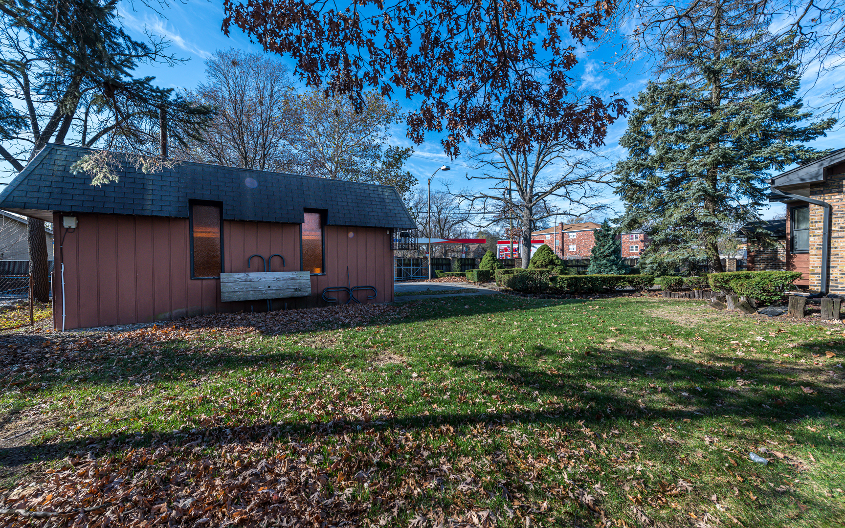 14400 Shepard Drive Dolton, IL 60419 - Photo 47 of 55 a front view of a house with a garden