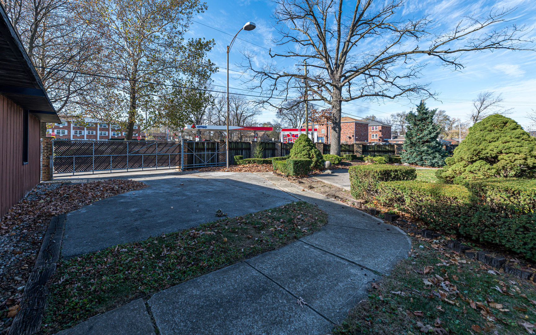 14400 Shepard Drive Dolton, IL 60419 - Photo 48 of 55 a front view of a house with a yard and shrubs