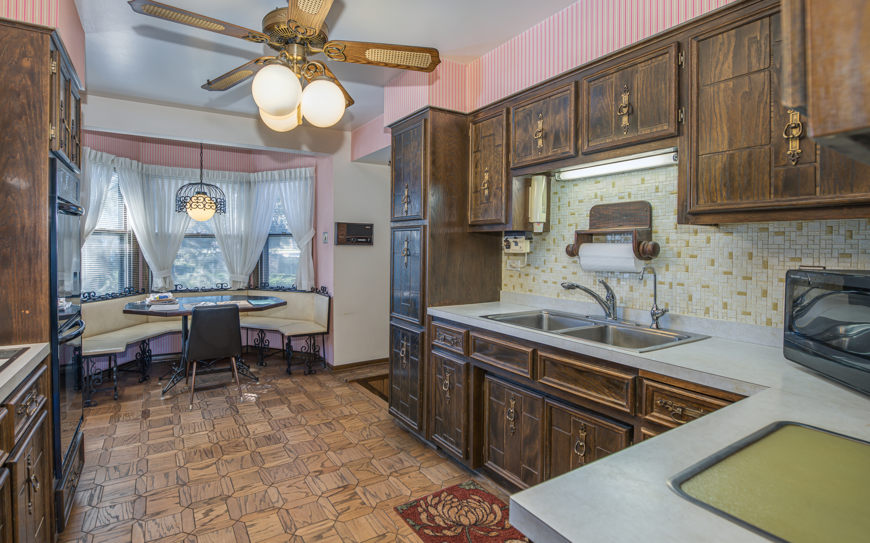 14400 Shepard Drive Dolton, IL 60419 - Photo 10 of 55 a kitchen with sink cabinets and stove