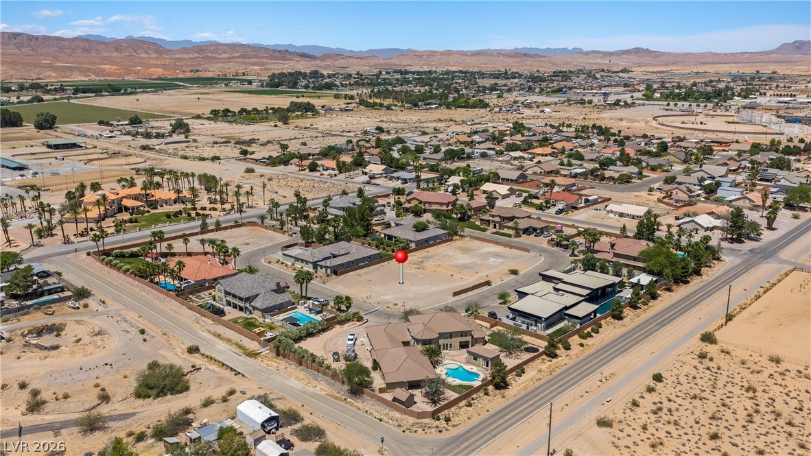 1141 Thomas Bay Circle Logandale, NV 89021 - Photo 4 of 16 An aerial view captures the vast potential of this desirable lot, surrounded by established homes.