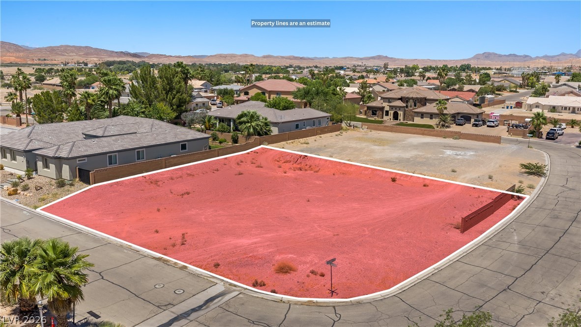 1141 Thomas Bay Circle Logandale, NV 89021 - Photo 8 of 16 This spacious lot offers a prime location for building a dream home with scenic mountain views.