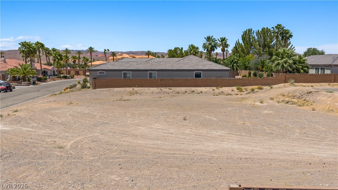 1141 Thomas Bay Circle Logandale, NV 89021 - Photo 10 of 16 This spacious vacant lot offers a prime building opportunity with captivating desert and mountain views.