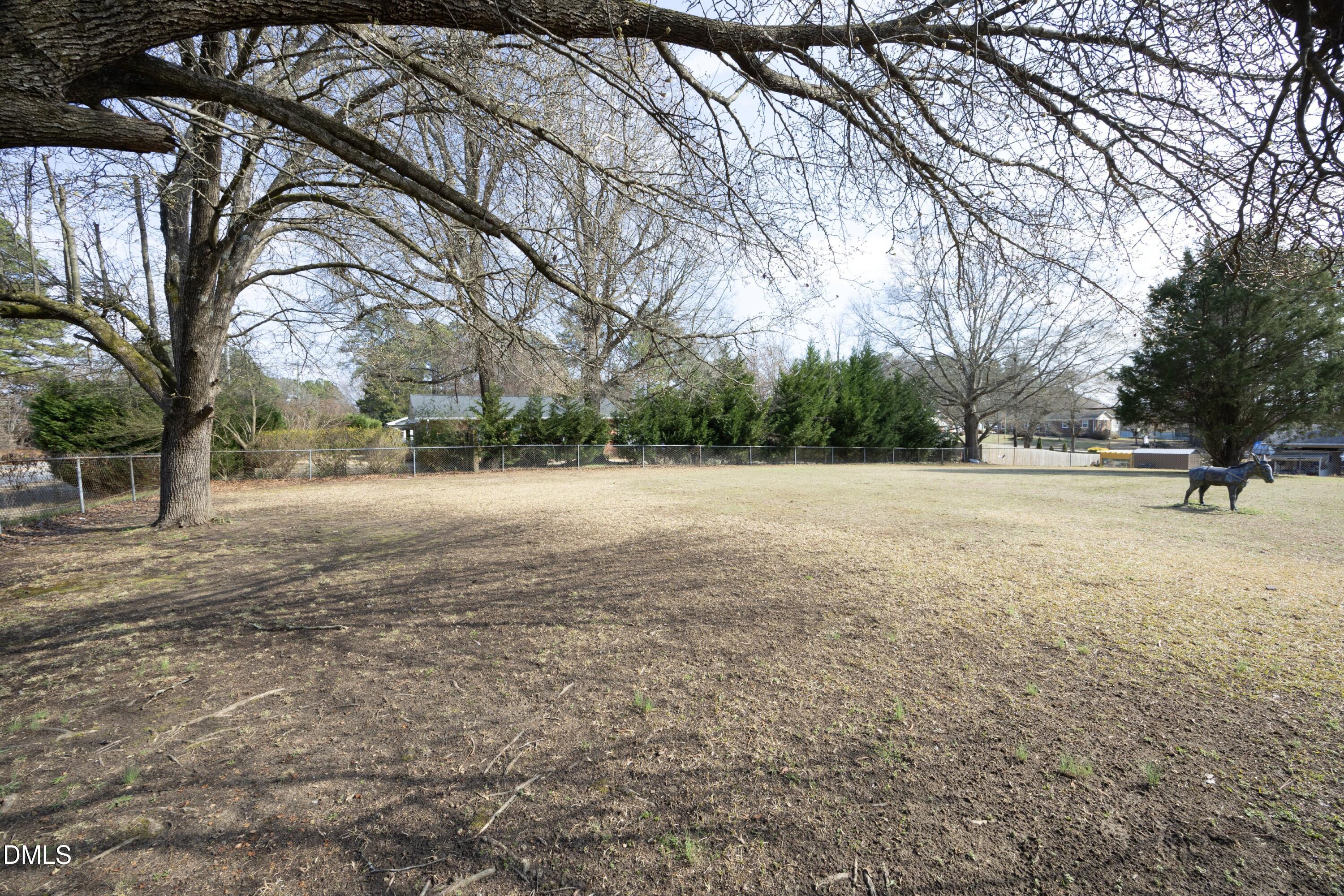 3504 Skycrest Drive Raleigh, NC 27604 - Photo 1 of 10 a view of outdoor space with trees