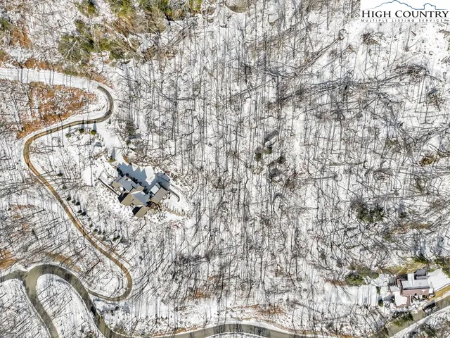 a view of a car parked in front of house