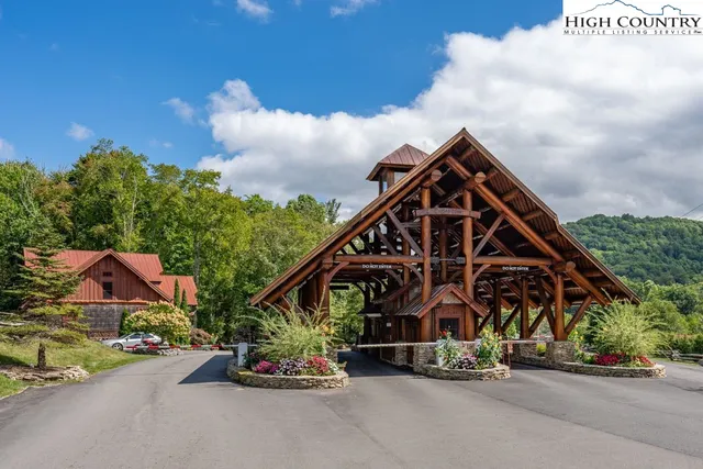 a balcony with furniture and wooden floor