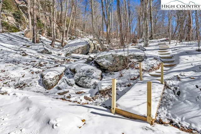 a room with a bed and a chair