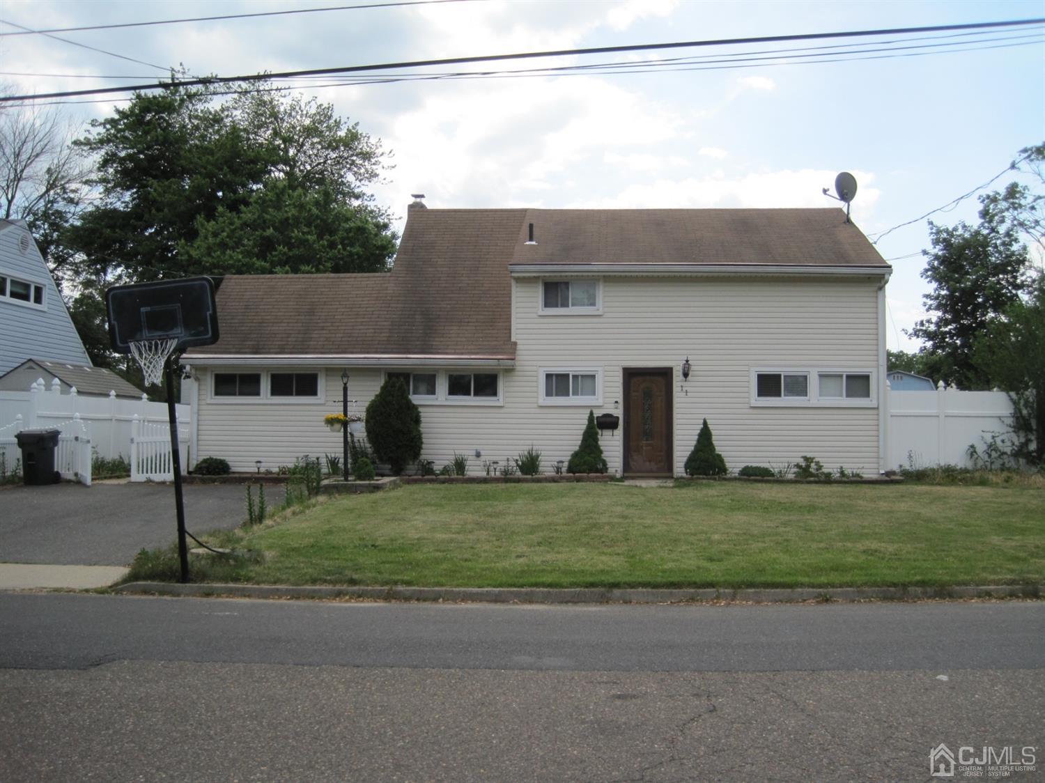 11 Pine Tree Road Old Bridge, NJ 08857 - Photo 1 of 12 a house view with a outdoor space