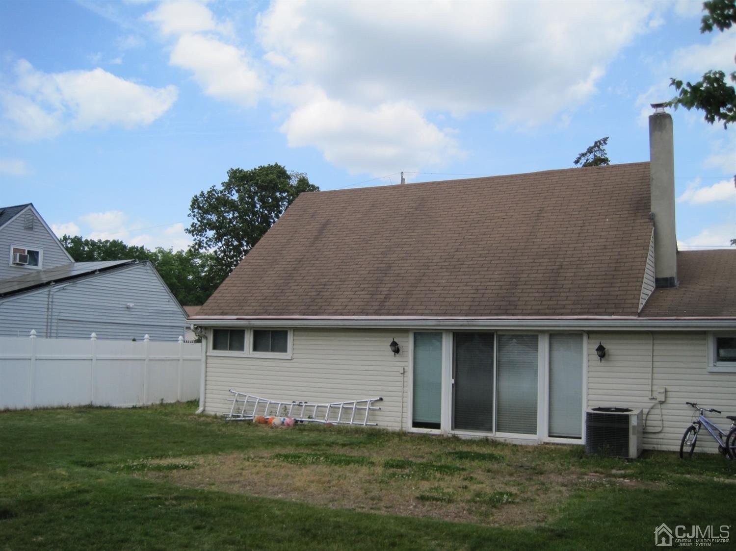11 Pine Tree Road Old Bridge, NJ 08857 - Photo 11 of 12 a view of a yard in front of a house