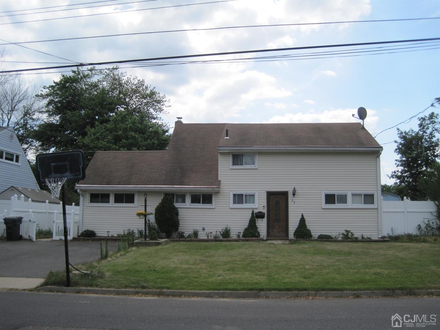 11 Pine Tree Road Old Bridge, NJ 08857 - Photo 12 of 12 a front view of a house with a yard