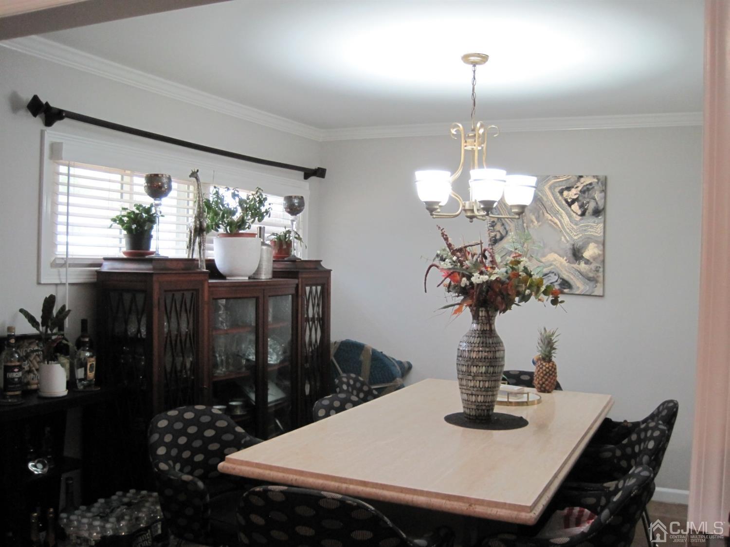 11 Pine Tree Road Old Bridge, NJ 08857 - Photo 4 of 12 a view of a dining room with furniture window and outside view