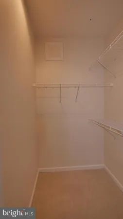 a view of small space with racks on the wall
