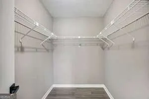 a view of a room with racks on the wall