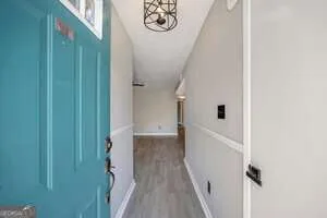 a view of a hallway with entryway