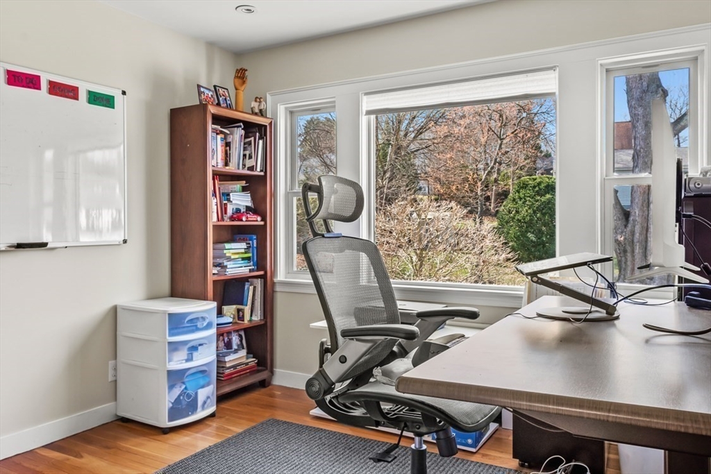 55 Wheeler Road Newton, MA 02459 - Photo 18 of 22 a view of a workspace with furniture and a window