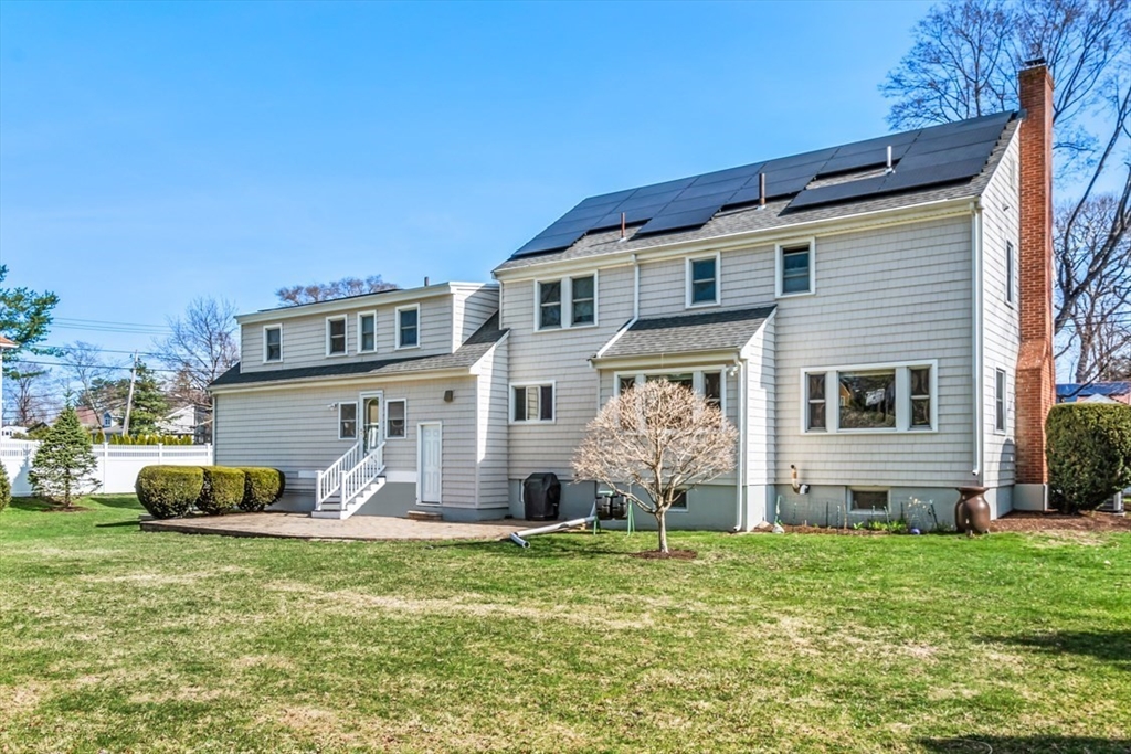 55 Wheeler Road Newton, MA 02459 - Photo 21 of 22 a front view of house with a garden