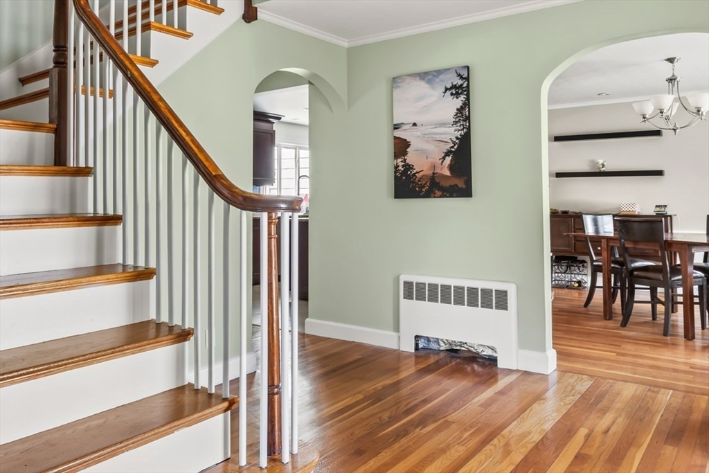 55 Wheeler Road Newton, MA 02459 - Photo 3 of 22 a view of entryway and hall with wooden floor