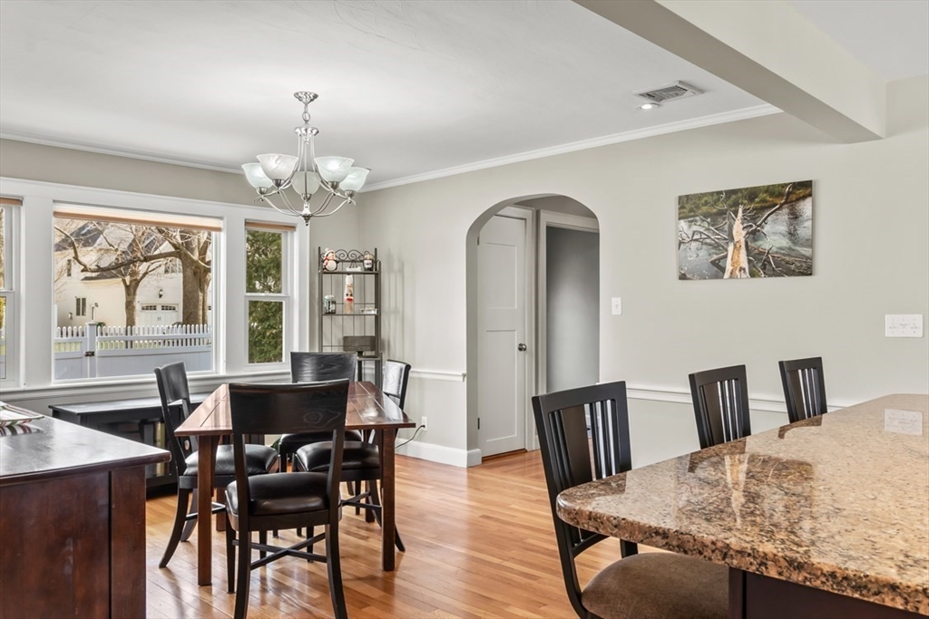 55 Wheeler Road Newton, MA 02459 - Photo 6 of 22 a view of a dining room with furniture window and wooden floor