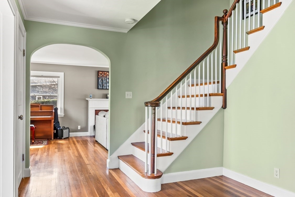 55 Wheeler Road Newton, MA 02459 - Photo 8 of 22 a view of entryway and hall with wooden floor