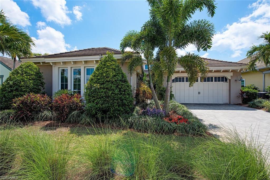 a front view of house with garden