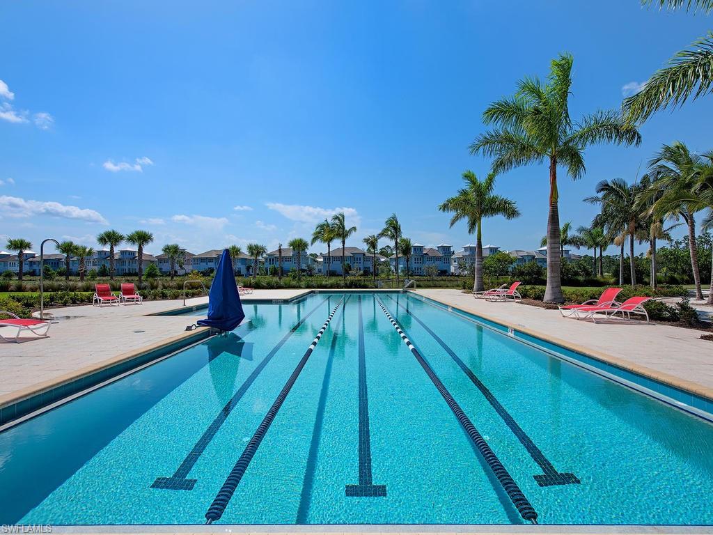 5098 Andros Drive Naples, FL 34113 - Photo 21 of 22 a view of swimming pool with outdoor seating