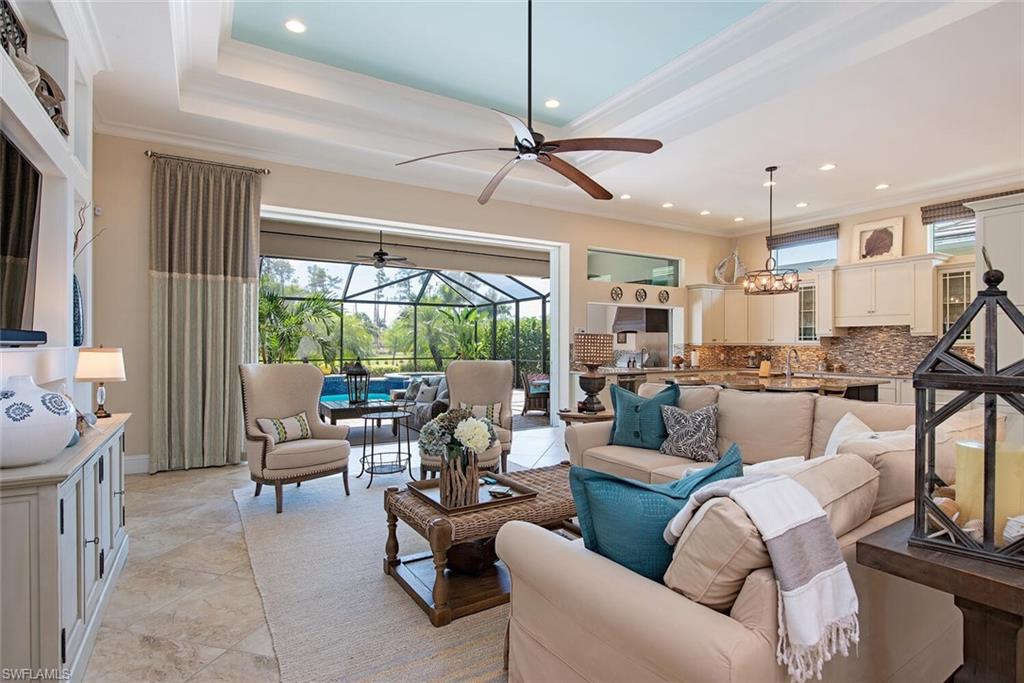 5098 Andros Drive Naples, FL 34113 - Photo 4 of 22 a living room with furniture and a large window