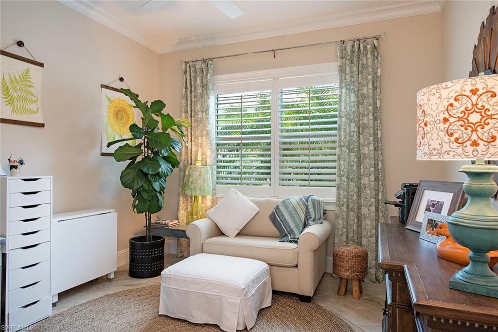 5098 Andros Drive Naples, FL 34113 - Photo 10 of 22 a living room with furniture and a potted plant