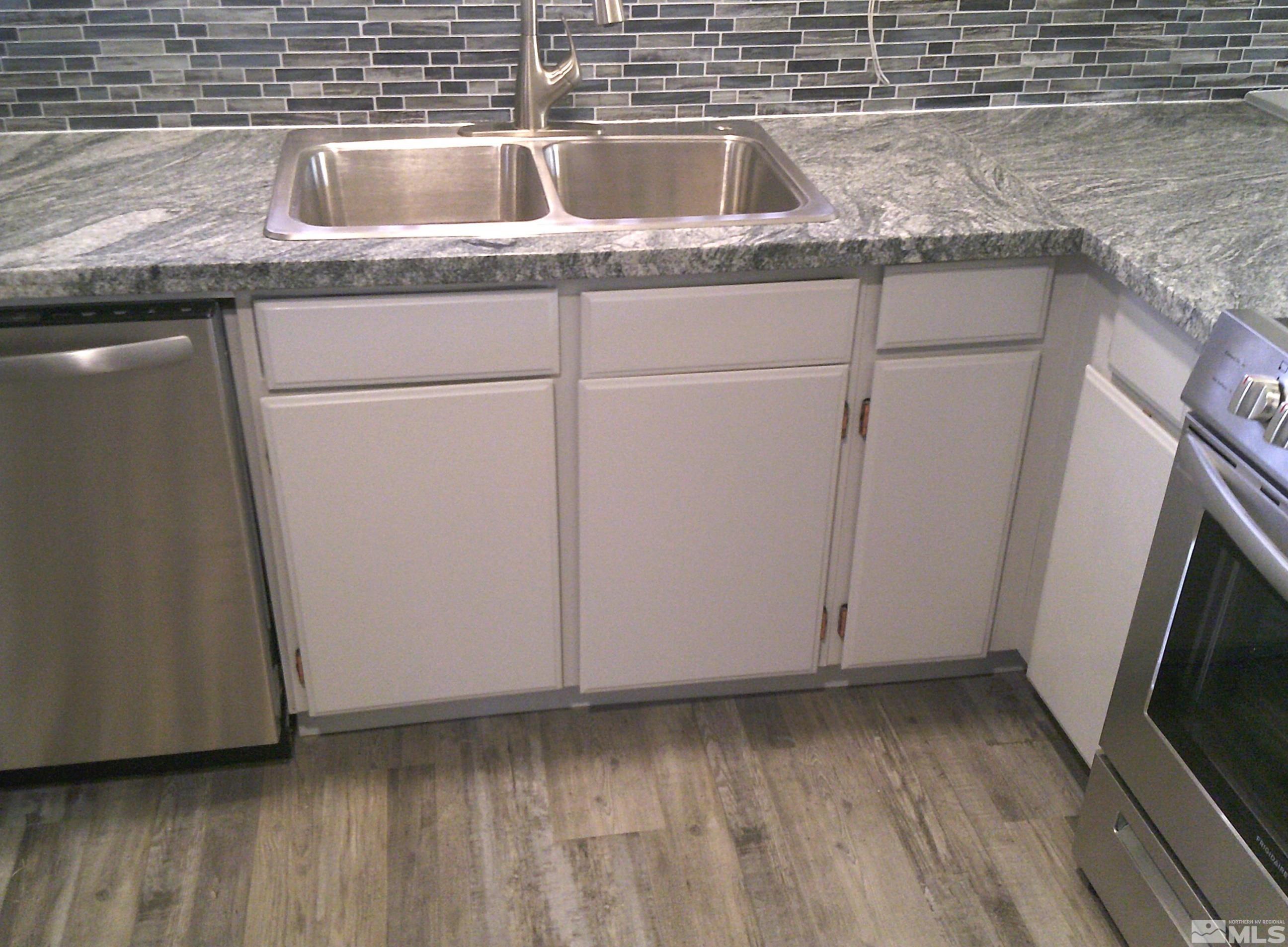 1456 Frontier Street Reno, NV 89503 - Photo 6 of 11 a close view of a sink a washer and dryer
