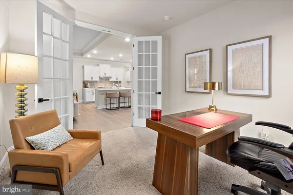 a bathroom with a shower sink and mirror