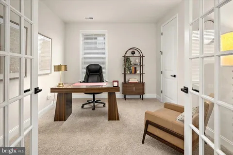 a spacious bathroom with a shower sink and mirror