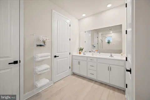 a bedroom with a bed and a closet