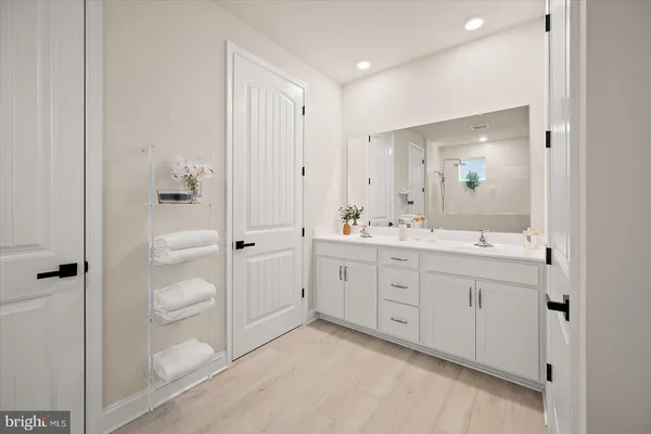 a bedroom with a bed and a closet