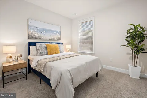 a view of swimming pool with seating