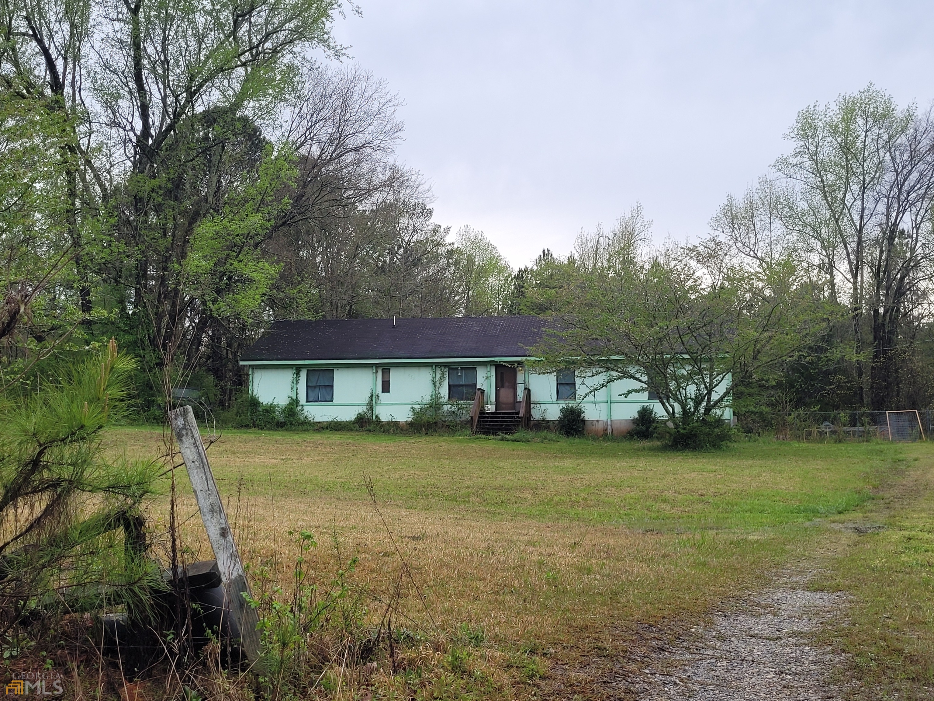 555 Moore Road Griffin, GA 30223 - Photo 1 of 1 a view of a house with a yard