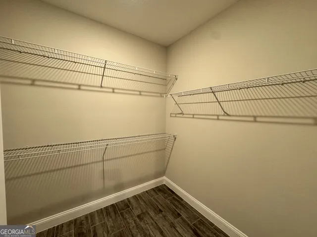 a view of a room with racks on the wall