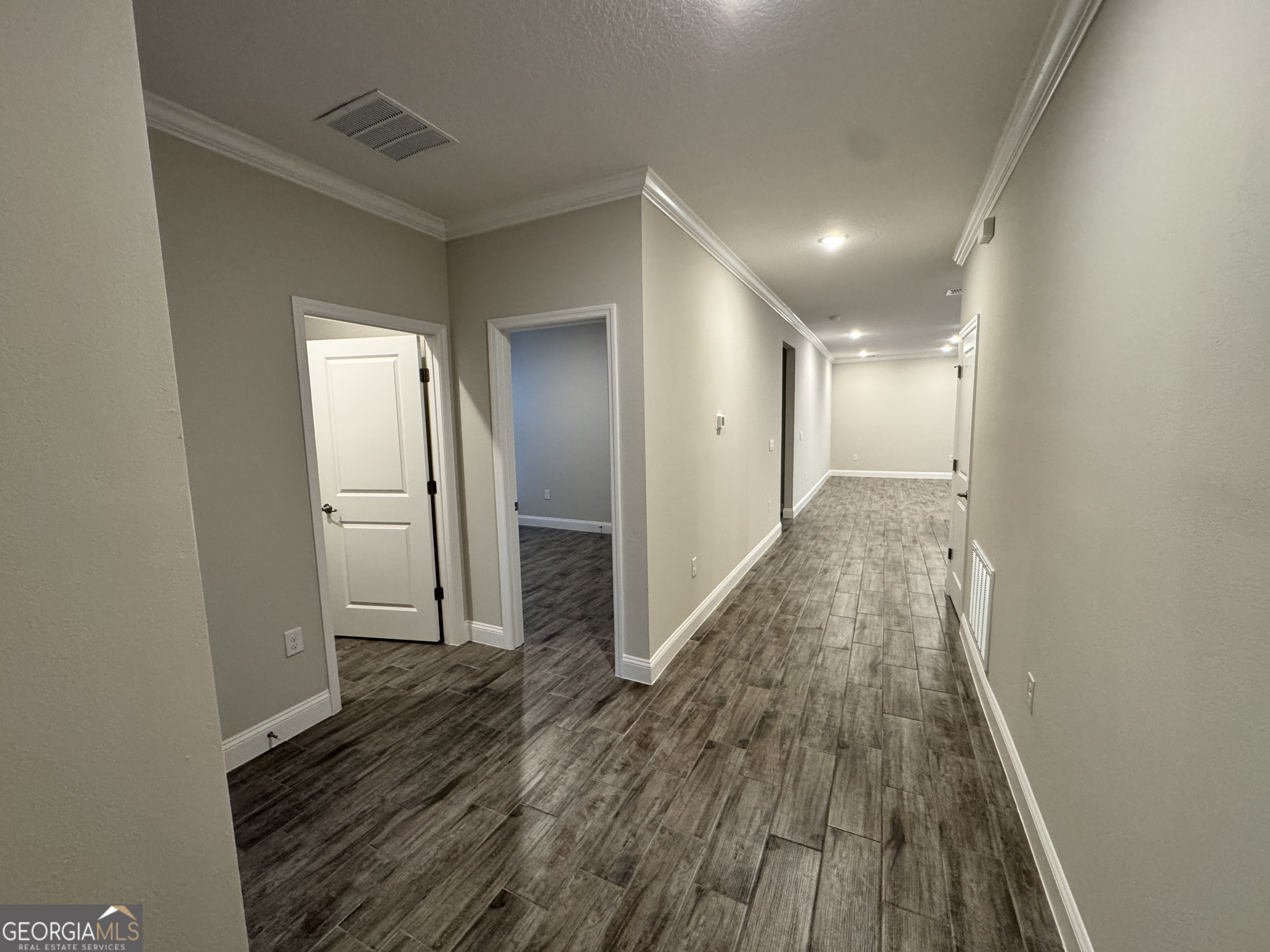 108 Brookshire Grn Court Kingsland, GA 31548 - Photo 3 of 21 a view of hallway with wooden floor