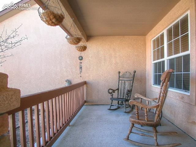 12153 Rio Secco Road Peyton, CO 80831 - Photo 3 of 26 Inviting front porch