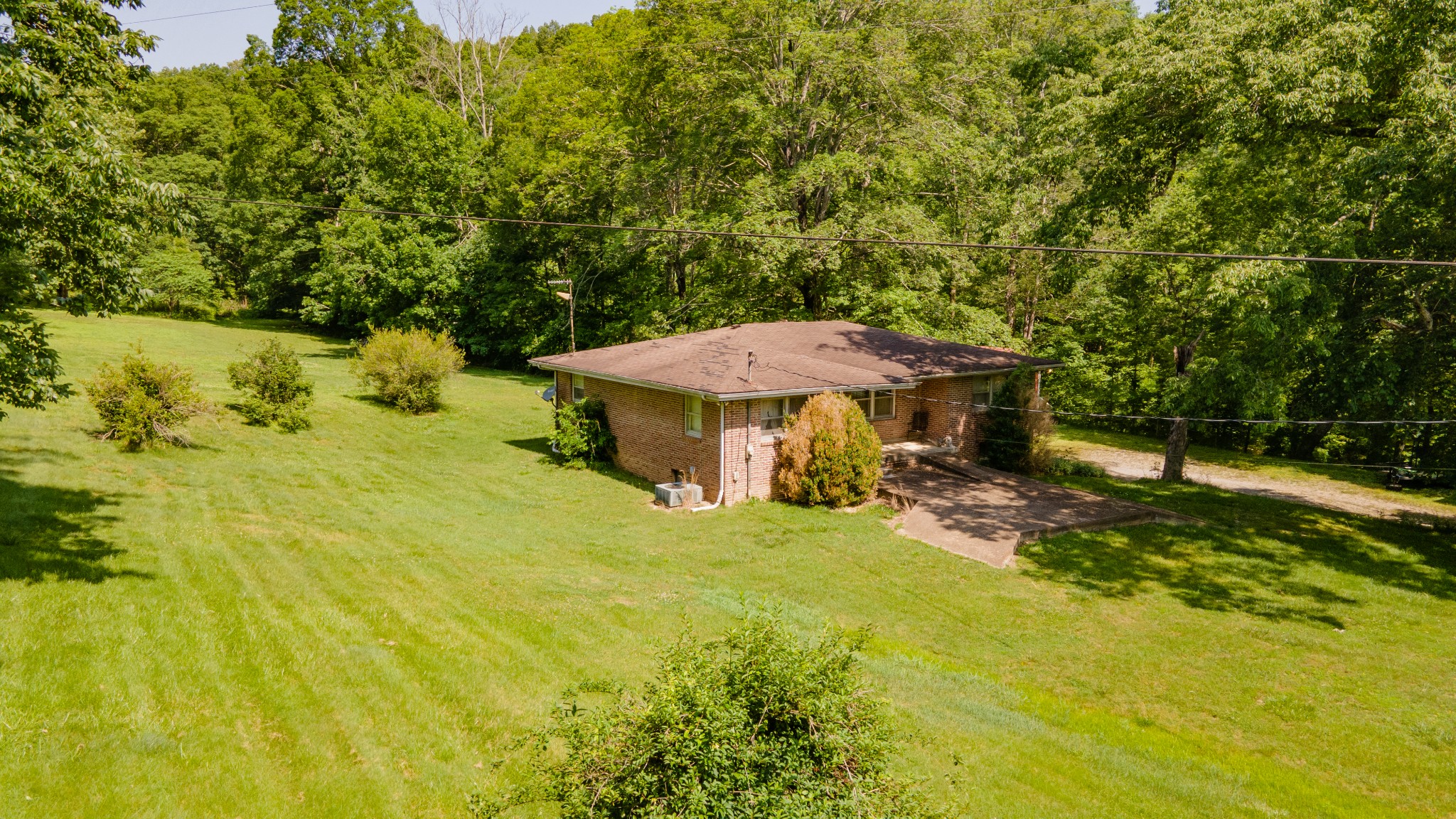 7390 South Harpeth Road Franklin, TN 37064 - Photo 8 of 13 a view of a swimming pool with a table and chairs