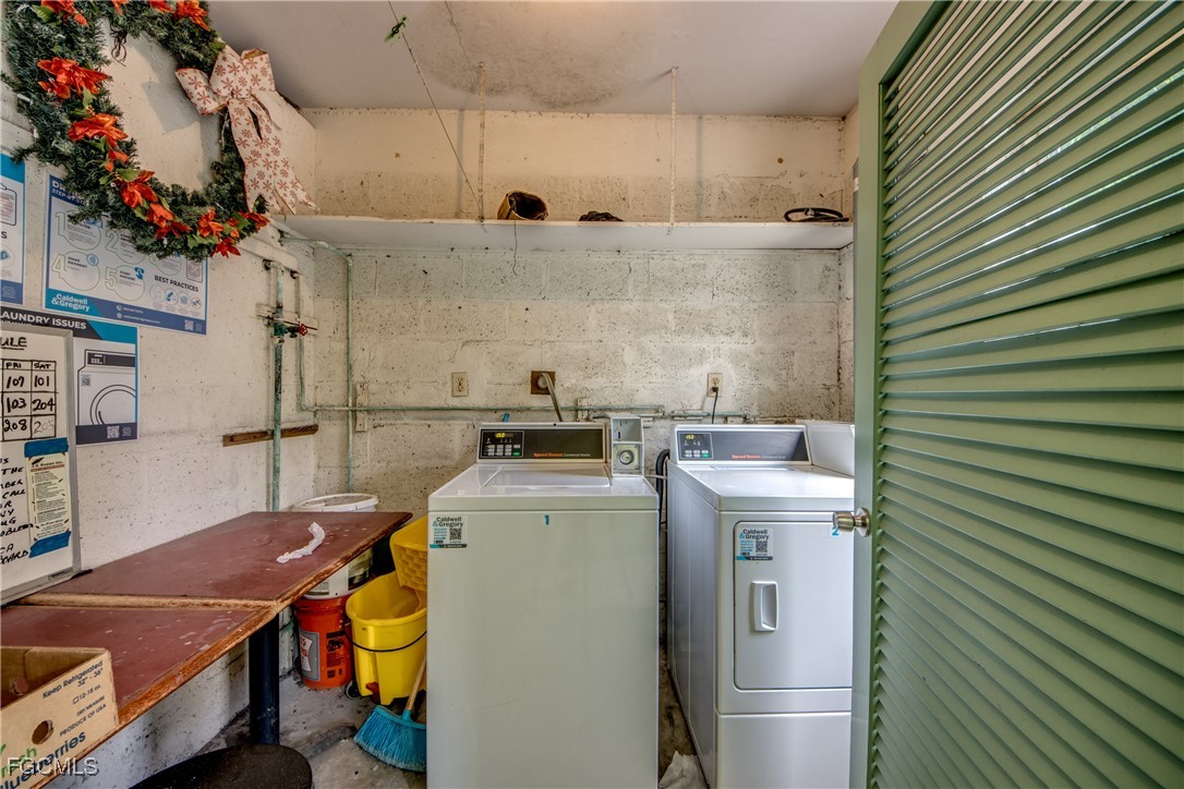 2544 First Street, Unit 107 Fort Myers, FL 33901 - Photo 32 of 35 a utility room with dryer and washer