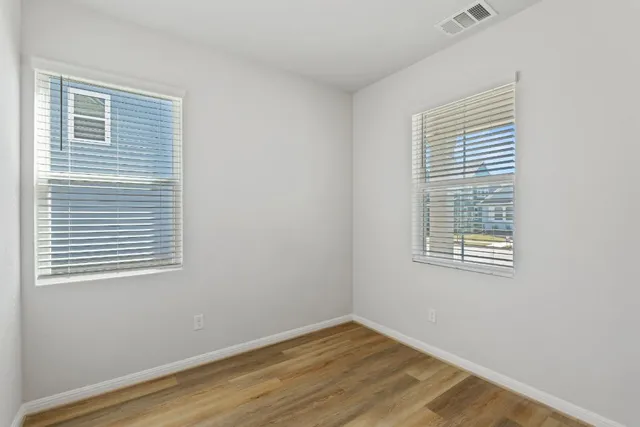 a view of a room that has a window in it