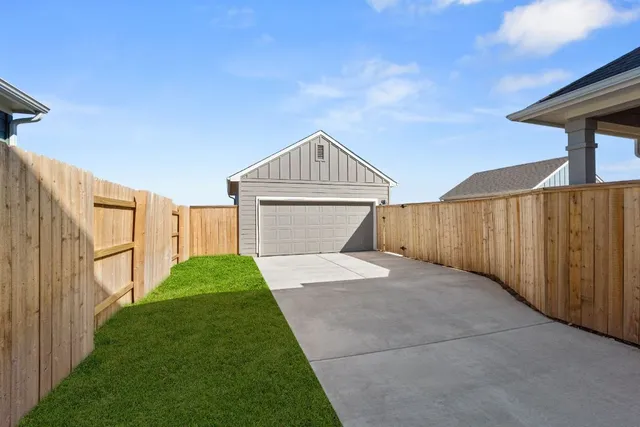 a view of a porch with a garden