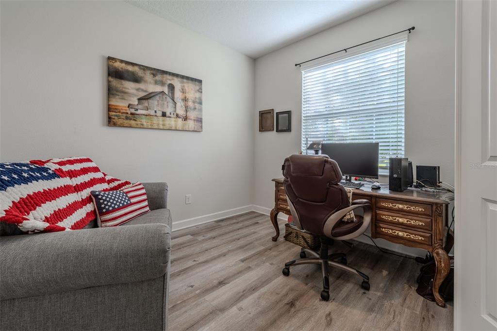 9224 Southwest 60th Ct Road Ocala, FL 34476 - Photo 35 of 55 a workspace with furniture and a window